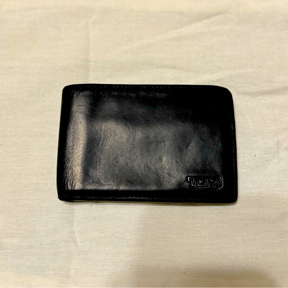 TUMI leather bifold wallet